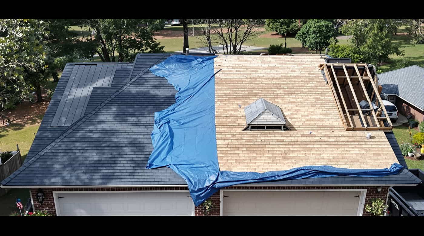 Residential roof replacement completed by Southern Roofing Systems on a home in Belforest, Baldwin County, Alabama showing new architectural shingles installed with six-nail pattern and sealed roof deck built for Gulf Coast conditions including 140 to 160 mph design wind speeds and 66 inches of annual rainfall across the southern Alabama climate
