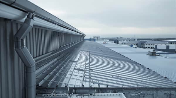 Commercial Metal Roofing commercial roofing service by Southern Roofing Systems — TPO membrane, EPDM single-ply, PVC roofing, and commercial metal roof installation for warehouses, retail centers, and office buildings across Mobile County and Baldwin County Alabama with flat roof drainage systems built for 66 inches annual Gulf Coast rainfall